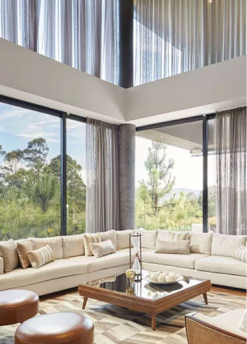 Luxury home with high-end motorized curtains.